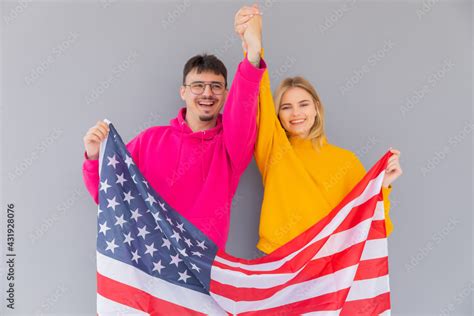 How Do Americans Celebrate Independence Day Man And Woman With Usa