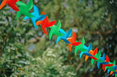 Selective Focus Photography Of Pinwheels On String · Free Stock Photo