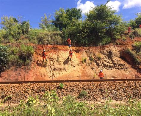 CONTENÇÃO DE ENCOSTAS RAPEL E DRENAGEM Atlas Engenharia e