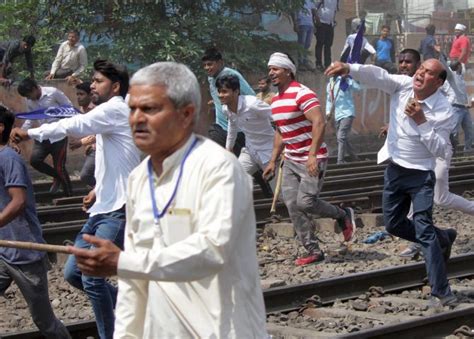 Dalit protests turn violent during Bharat bandh, 9 dead - Rediff.com ...