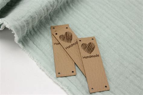 КОЖАНАЯ БИРКА С НАДПИСЬЮ HANDMADE НА-127 от интернет-магазина тканей и ...