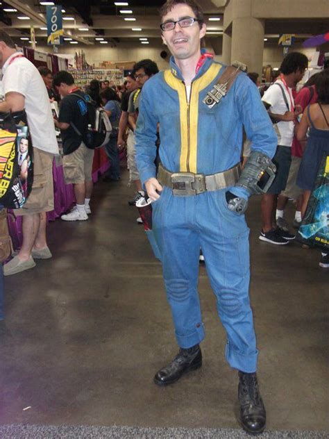 a man dressed in a blue and yellow costume