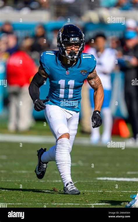 Jacksonville Jaguars wide receiver Parker Washington (11) runs a play