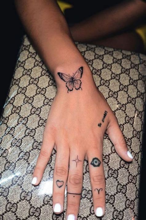 Meaningful Small Butterfly Tattoo Ideas Hand And Finger Tattoos