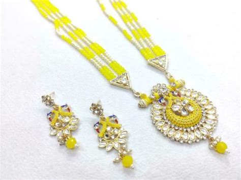 Buy Vaishnavi Imitation Gold Plated Alloy Earring Necklace Set