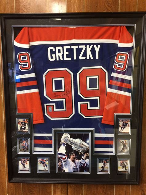 WAYNE GRETZKY FRAMED AUTOGRAPHED JERSEY COLLAGE DISPLAY (WG COA)