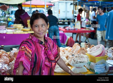 asian woman selling shells sabah malaysia stock photo alamy