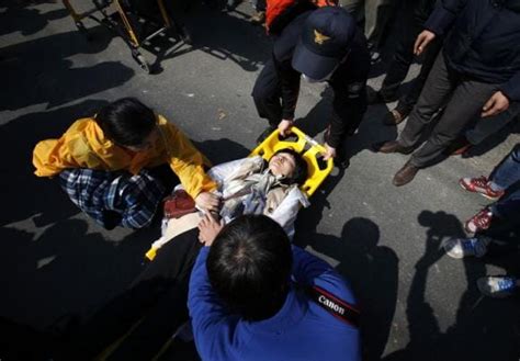 Angry Relatives Clash With Police As Korea Recovers More Dead From