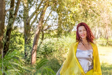 German Mature Woman In A Green Garden Stock Photo Adobe Stock