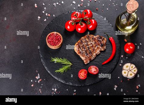 Ribeye Steak With Potatoes Onions And Cherry Tomatoes Juicy Steak