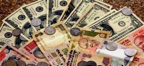 Rupee Gains Paise Against Dollar In Early Trade