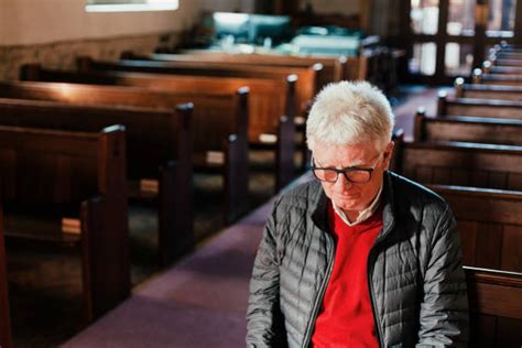 Man Sitting In Church Stock Photos Pictures And Royalty Free Images Istock