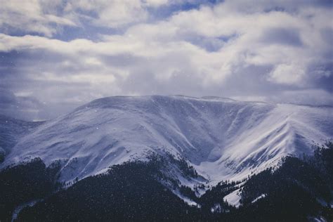 Snow Covered Rocky Mountain · Free Stock Photo