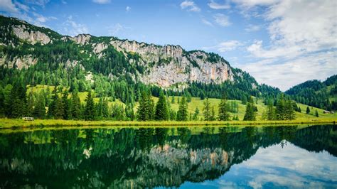 blue sky lake mountains green leaves trees reflection water landscape ...