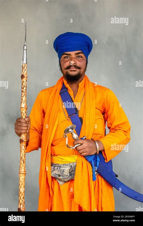 Portrait of a Sikh warrior in traditional dress with weapons Stock ...