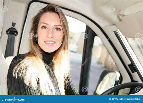 Beautiful Woman Driving Motor Home Rv Camping Van Driver Smiling In