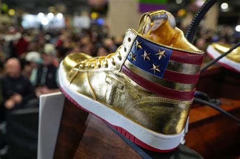 Photos: Trump unveils $399 ‘Never Surrender’ sneakers day after $355M ...