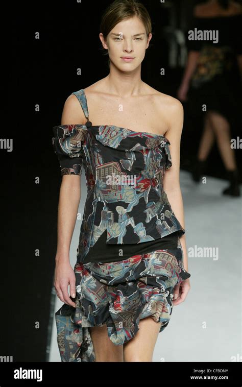 Hussein Chalayan Paris Ready To Wear Autumn Winter Model Brunette Hair Off Face Wearing