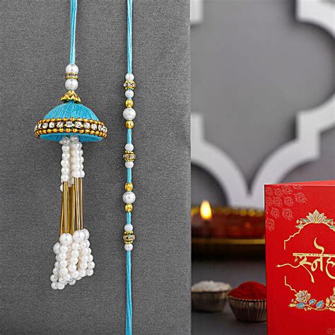 Buy Send Tranquil Teal Jhumar Bhaiya Bhabhi Pearl Rakhi Set Online Fnp