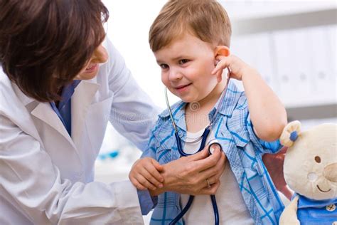 Doctor Examining Child Stock Image Image Of Childhood 6997107