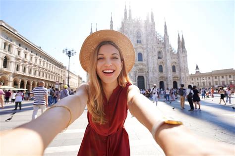 Premium Photo Smiling Young Woman Takes Selfie Picture In The City Of