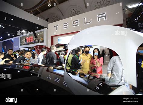 Visitors Flock To The Booth Of Tesla An American Electric Vehicle And