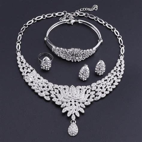 Flower And Crystal Necklace Bracelet Earrings And Ring Wedding Stateme Innovato Design