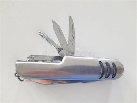 Military Issued Swiss Army Knife With Multiple Tools And Uses Stock