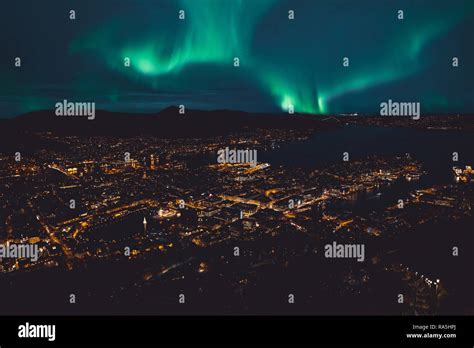 A view of Bergen (Norway), with northern lights Stock Photo - Alamy