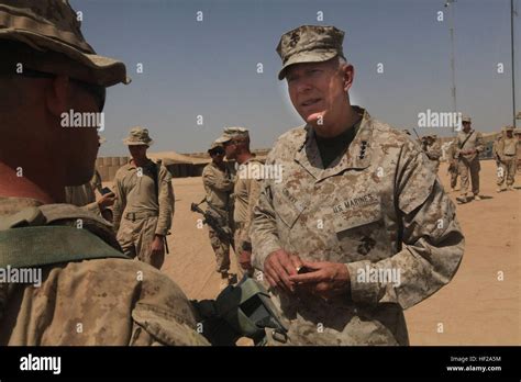 The Commandant Of The Marine Corps Gen James T Conway Speaks With A Marine From Lima Company