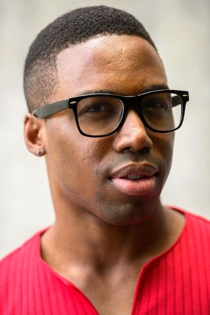 Premium Photo Close Up Portrait Of Young Man Wearing Eyeglasses