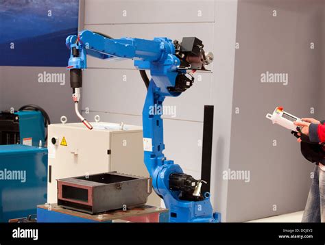 industrial robot arm Stock Photo - Alamy