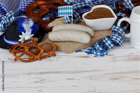 Weißwurst mit Senf und Brezel Stock Foto Adobe Stock