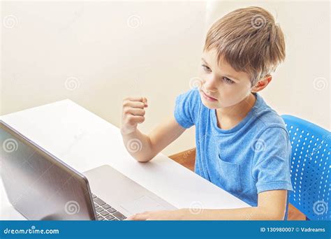 Kid Playing Computer Games With Laptop At Home Stock Image Image Of