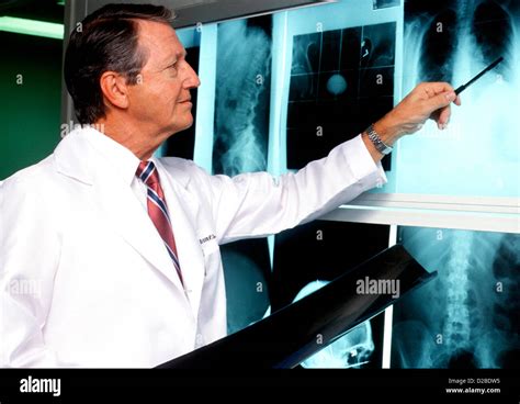 Doctor Examining X Rays Stock Photo Alamy