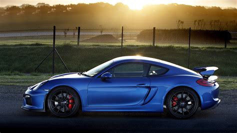 Foto Porsche Cayman Gt Hellblau Seitlich Automobil X