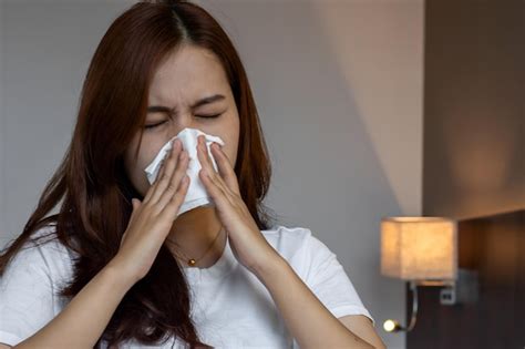 Premium Photo Asian Woman Suffering From Runny Nose Or Nasal Blocking