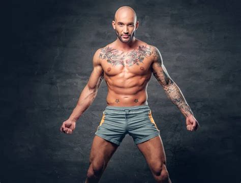 Shirtless Muscular Man With Tattoos Stock Photo By Fxquadro