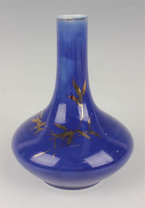 A Chinese Powder Blue Glazed Porcelain Bottle Vase Circa 1980s The Compressed Circular Body And Na