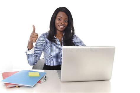 Black African American Ethnicity Woman Working At Computer Laptop At Office Desk Smiling Happy