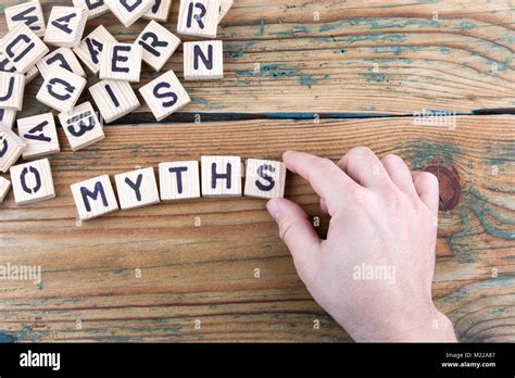 Myths Wooden Letters On The Office Desk Informative And Communication