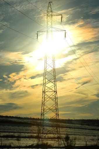 High Voltage Electric Pole Set As One Of Many On The Entire Length Of