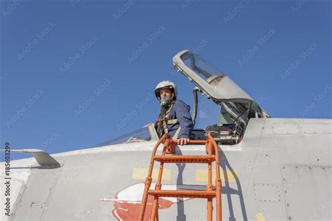 Military pilot in the cockpit of a jet aircraft Stock Photo | Adobe Stock