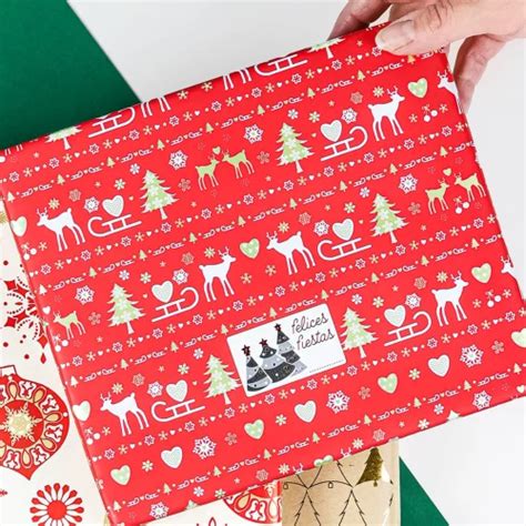 Bobina Papel Regalo Elementos Navideños Blancos y Dorados