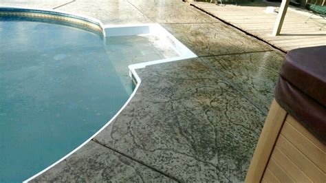 Stamped and colored concrete pool deck by Sierra Concrete Arts Concrete ...