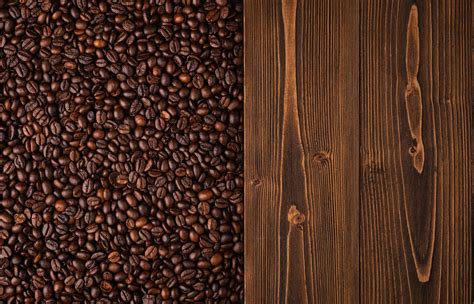 Roasted Coffee Beans And Wooden Texture Top View Brown Coffee Beans