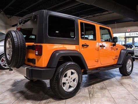 2012 Jeep Wrangler Unlimited Orange Crush Exterior 5 Speed Auto 58k