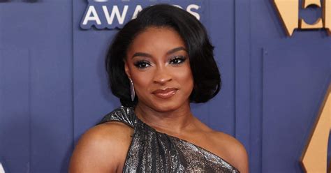 Simone Biles Shows Off Figure In Bikini While On Girls Trip Photos