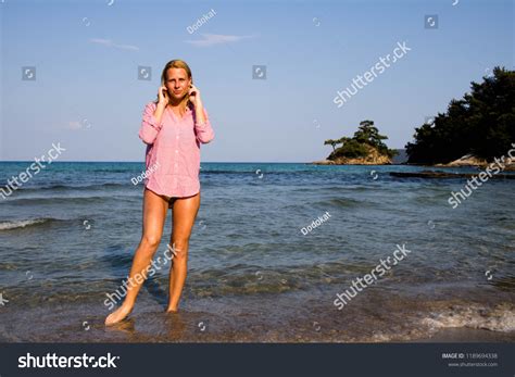 Blonde Woman Hands Her Hair Posing Stock Photo 1189694338 Shutterstock