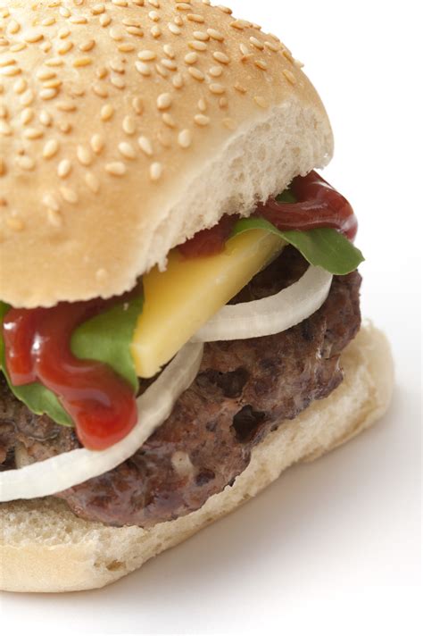cropped view  hamburger  sesame bun  stock image